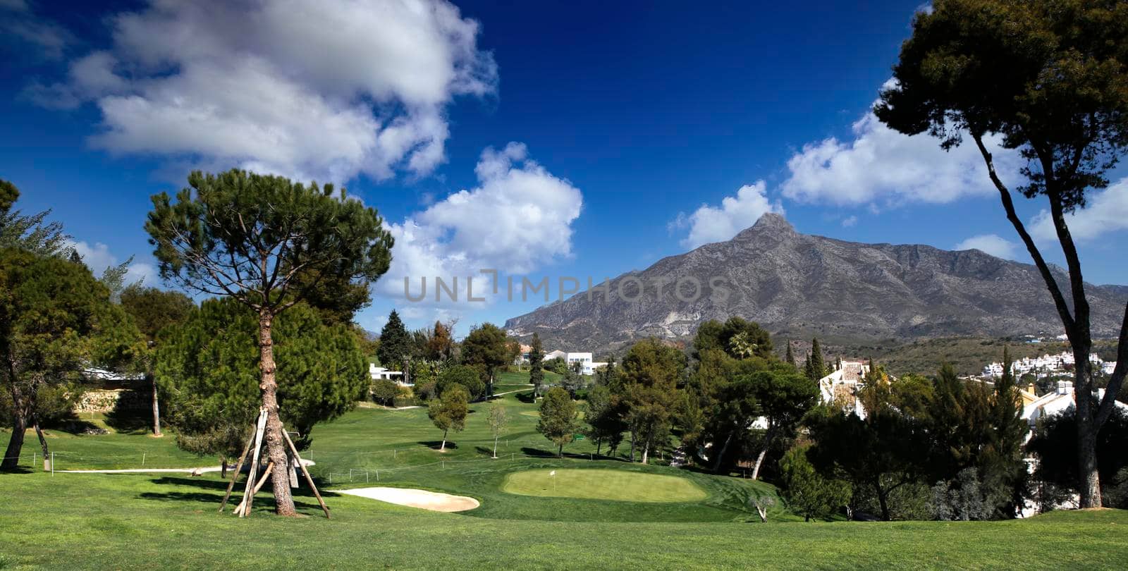 golf course and green  in Marbella, Spain, at sunset