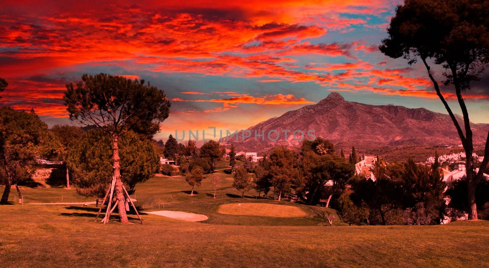 golf course and green  in Marbella, Spain, at sunset