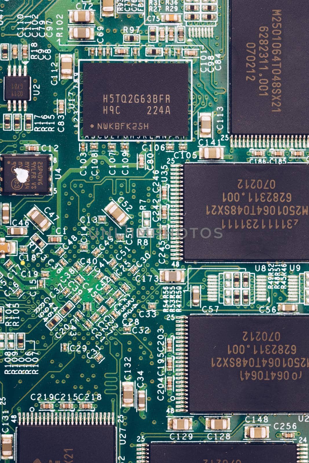 Electronic circuit board close up. Electronic computer hardware technology. Motherboard digital chip. Tech science background. Integrated communication processor. Information engineering component.