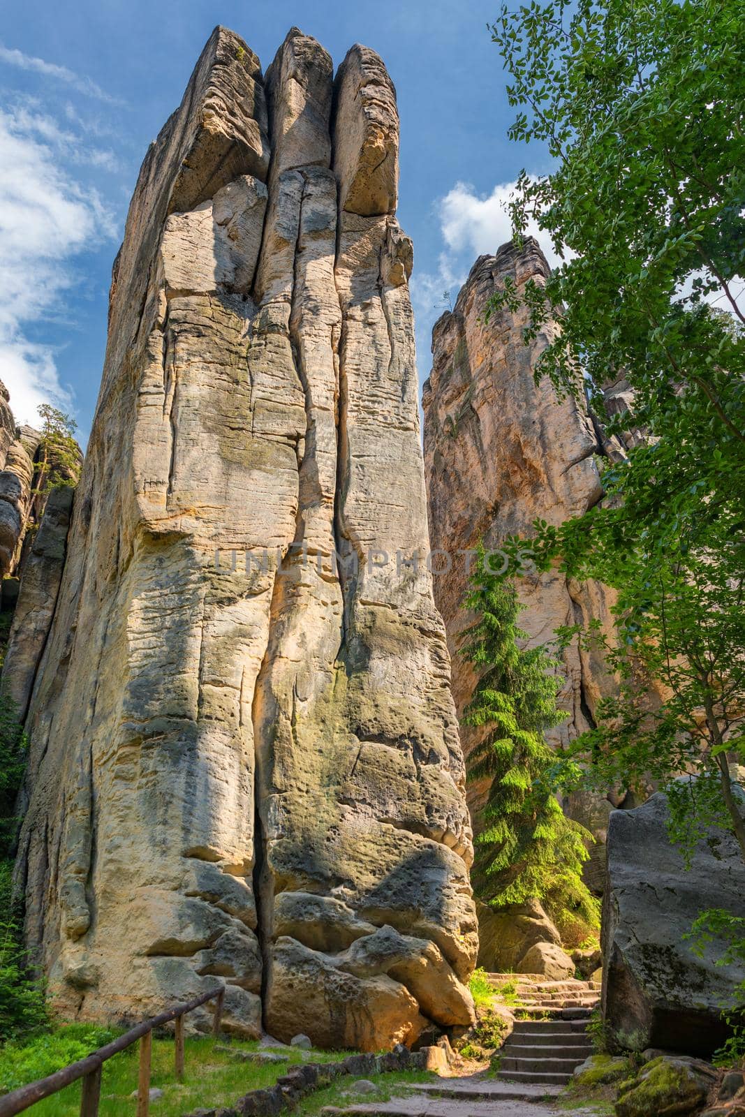 Prachov rocks (Prachovske skaly) in Cesky Raj region, Czech Republic. Sandstone rock formation in vibrant forest. Prachov Rocks, Czech: Prachovske skaly, in Bohemian Paradise, Czech Republic.