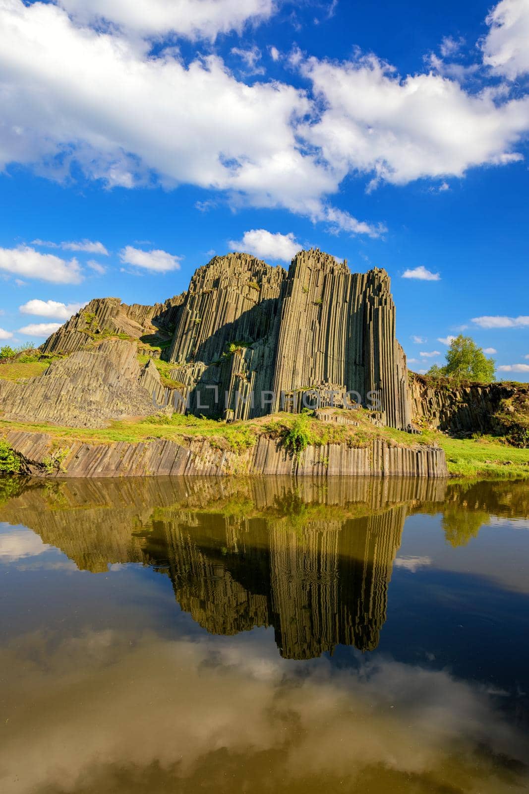 Polygonal structures of basalt columns, natural monument Panska skala near Kamenicky Senov, Czech Republic. Basalt organ pipes of Panska Skala near Kamenicky Senov, Czechia. 