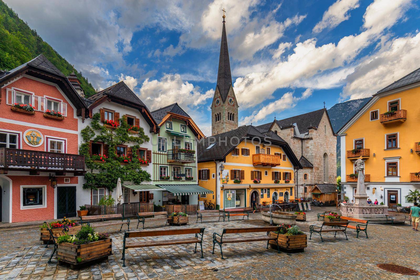 View of famous Hallstatt mountain village in the Austrian Alps at beautiful light in summer, Salzkammergut region, Hallstatt, Austria. Hallstatt village on Hallstatter lake in Austrian Alps.