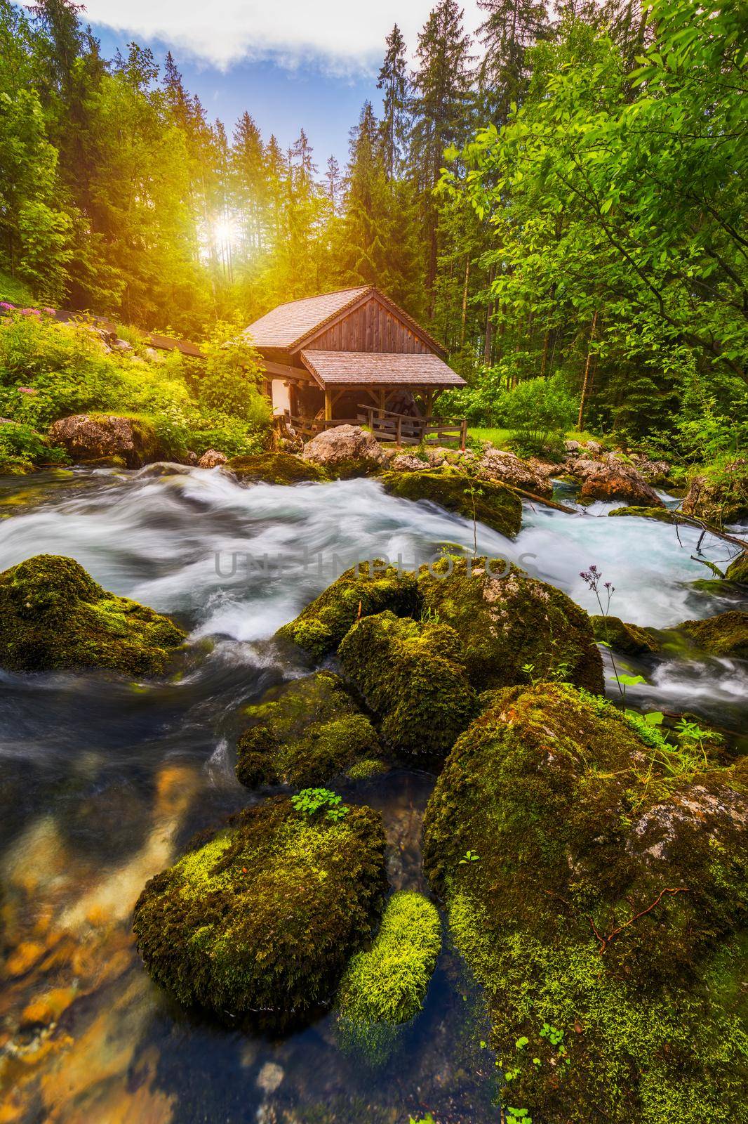 The Gollinger Mill at the Gollinger Waterfall in Golling, Salzburg, Austria. An old water mill near Gollinger waterfall south of Salzburg. 