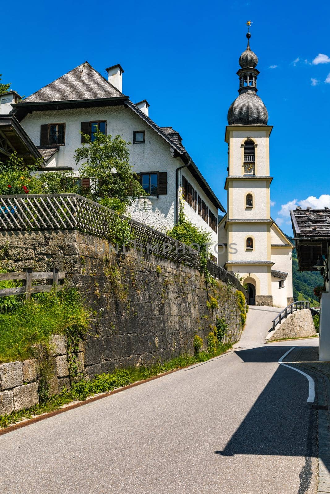 Parish Church of St. Sebastian in the village of Ramsau, Nationalpark Berchtesgadener Land, Upper Bavaria, Germany. Colorful view of Parish Church of St. Sebastian, Ramsau bei Berchtesgaden, Germany.