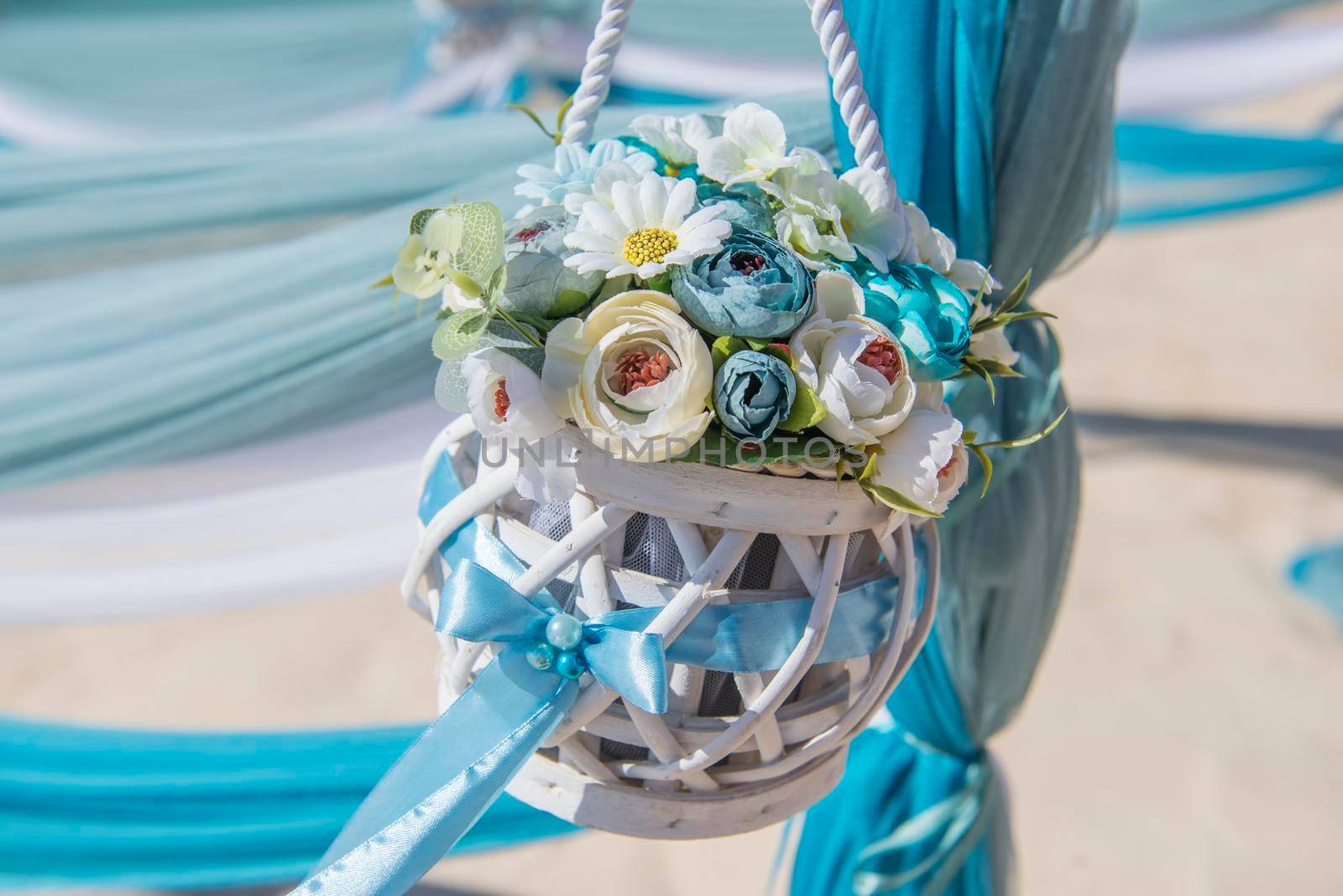 Wedding aisle setup on tropical beach with flower bouquet by paulvinten
