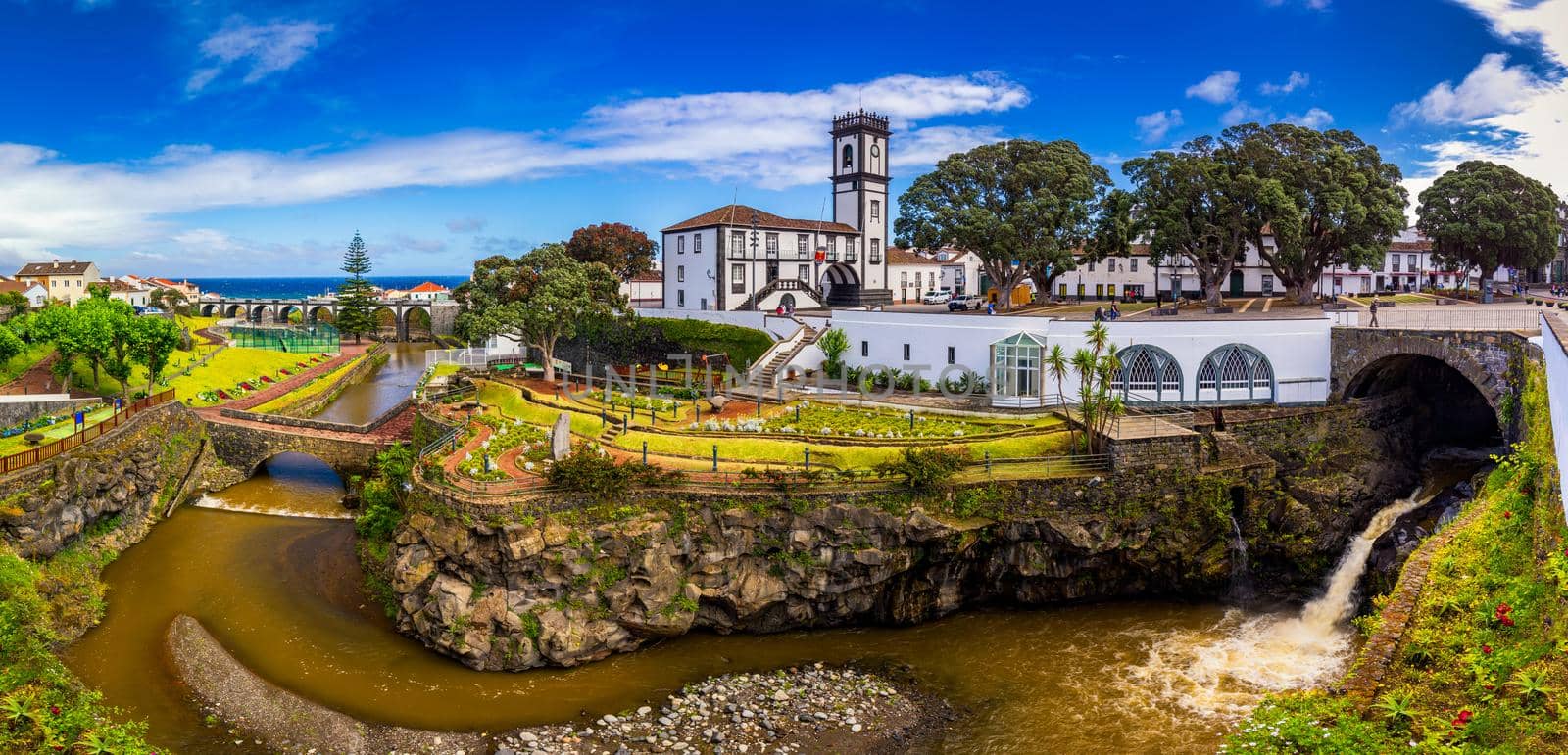 Panoramic cityscape view to Municipality and central square Of Ribeira Grande, Sao Miguel, Azores, Portugal. Central square of Ribeira Grande, Sao Miguel, Azores, Portugal.