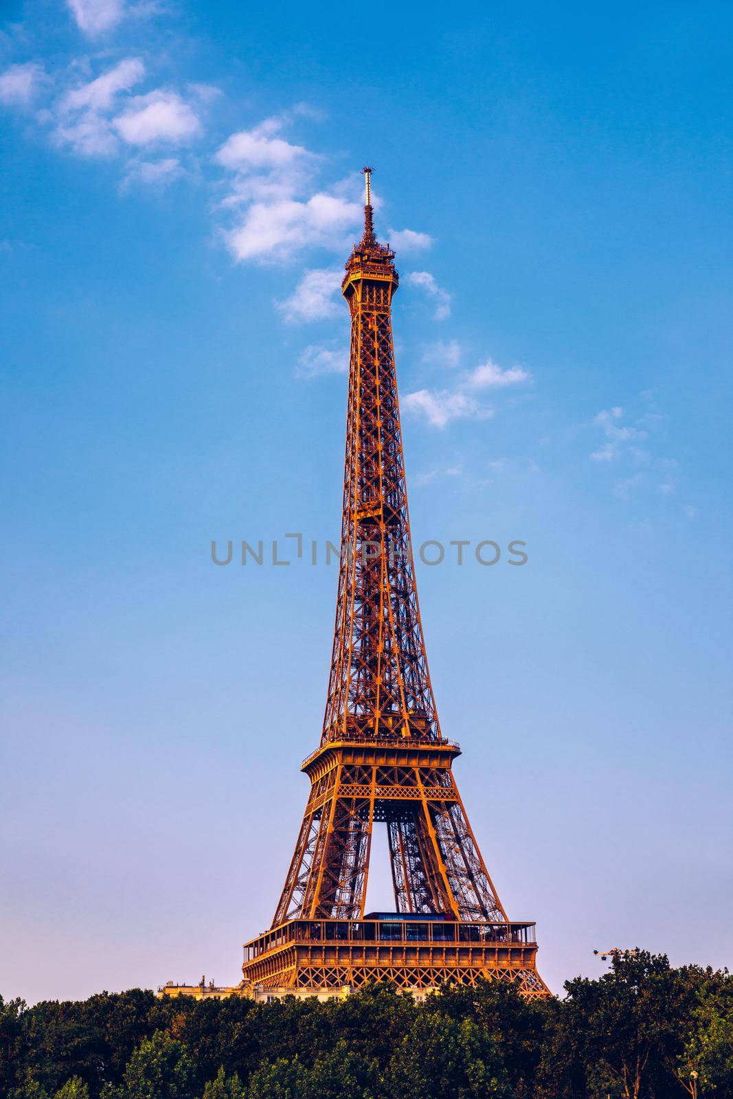 Paris Eiffel Tower and river Seine at sunset in Paris, France. Eiffel Tower is one of the most iconic landmarks of Paris. Eiffel tower in summer, Paris, France. The Eiffel Tower in Paris, France.