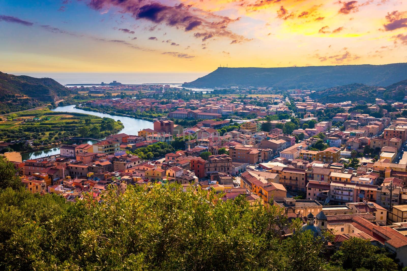 Beautiful view of Bosa town, Sardinia island, Italy. Travel destination. Bosa town with Ponte Vecchio bridge across the Temo river. Marvelous morning view of Sardinia island, Italy, Europe.