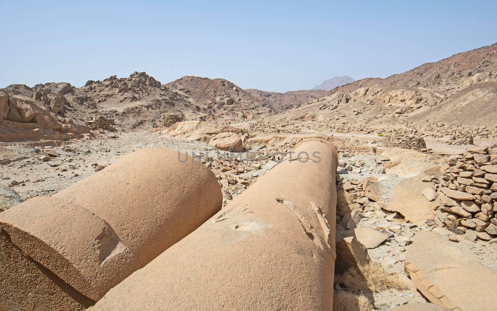 View across old abandoned column pillar at Roman quarry town Mons Claudianus in Egyptian eastern desert