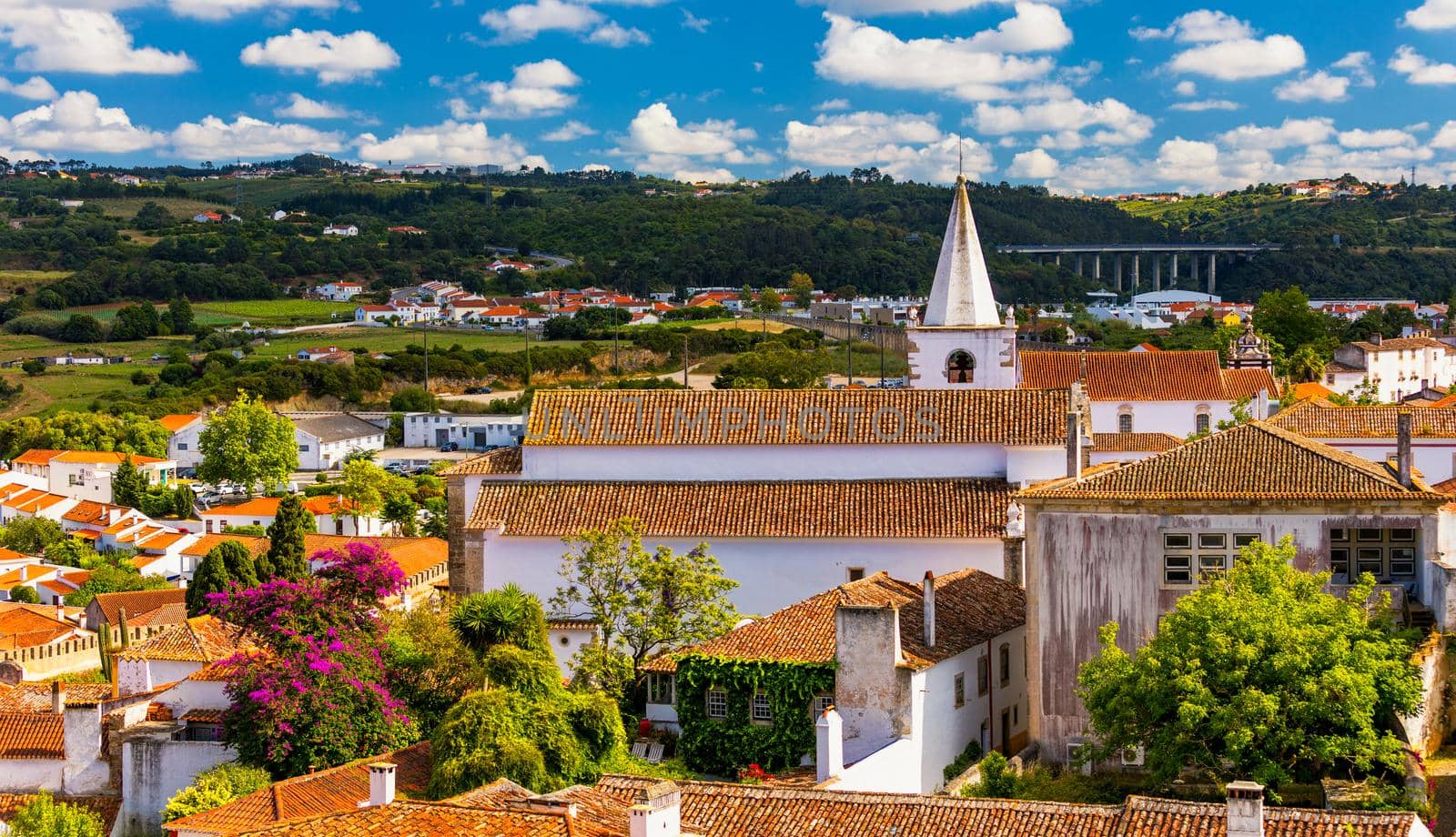 Obidos, Portugal stonewalled city with medieval fortress, historic walled town of Obidos, near Lisbon, Portugal. Beautiful view of Obidos Medieval Town, Portugal. 