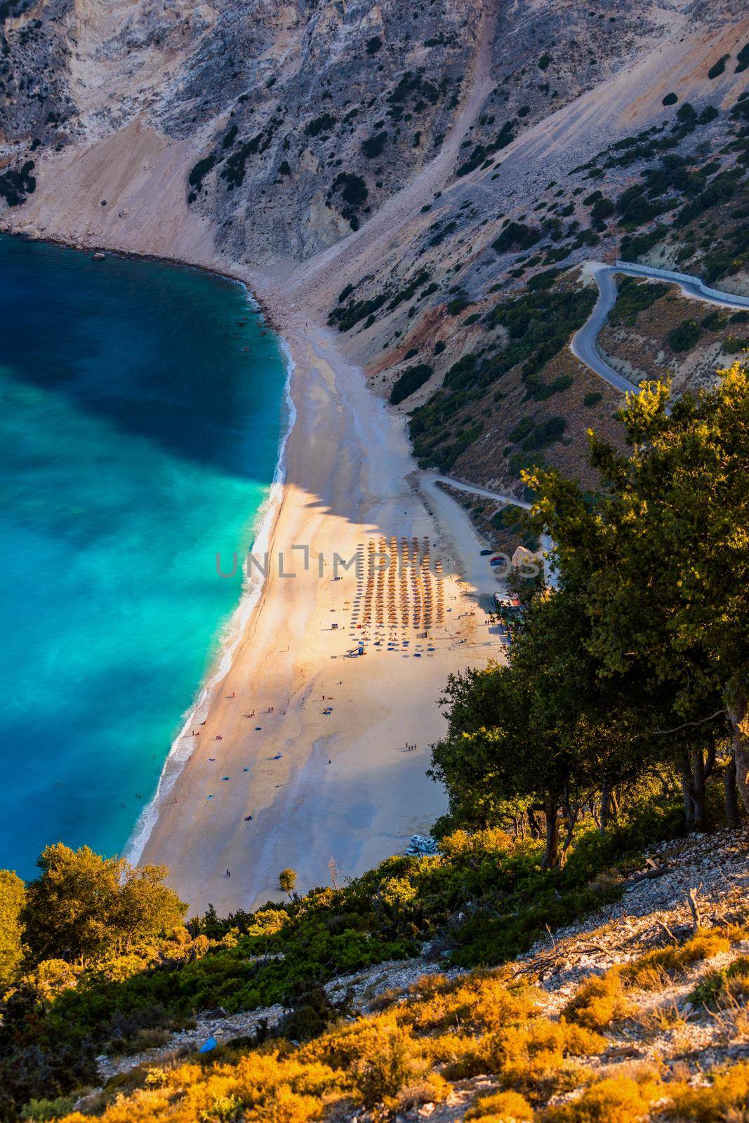 Aerial drone view of iconic turquoise and sapphire bay and beach of Myrtos, Kefalonia (Cephalonia) island, Ionian, Greece. Myrtos beach, Kefalonia island, Greece. Beautiful view of Myrtos beach.