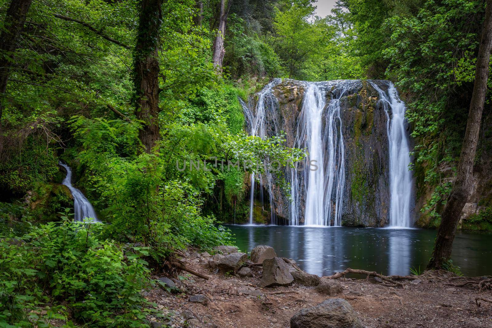 Beautiful big waterfall in Spain in Catalonia, near the small village Les Planes de Hostoles by Digoarpi