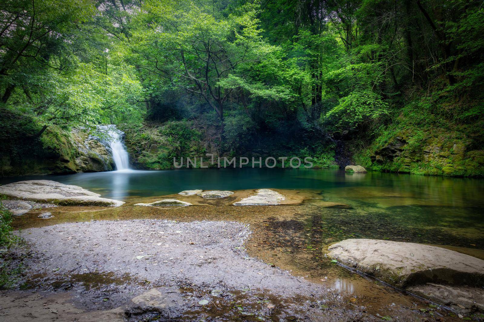 Beautiful waterfall in Spain in Catalonia, near the small village Les Planes de Hostoles