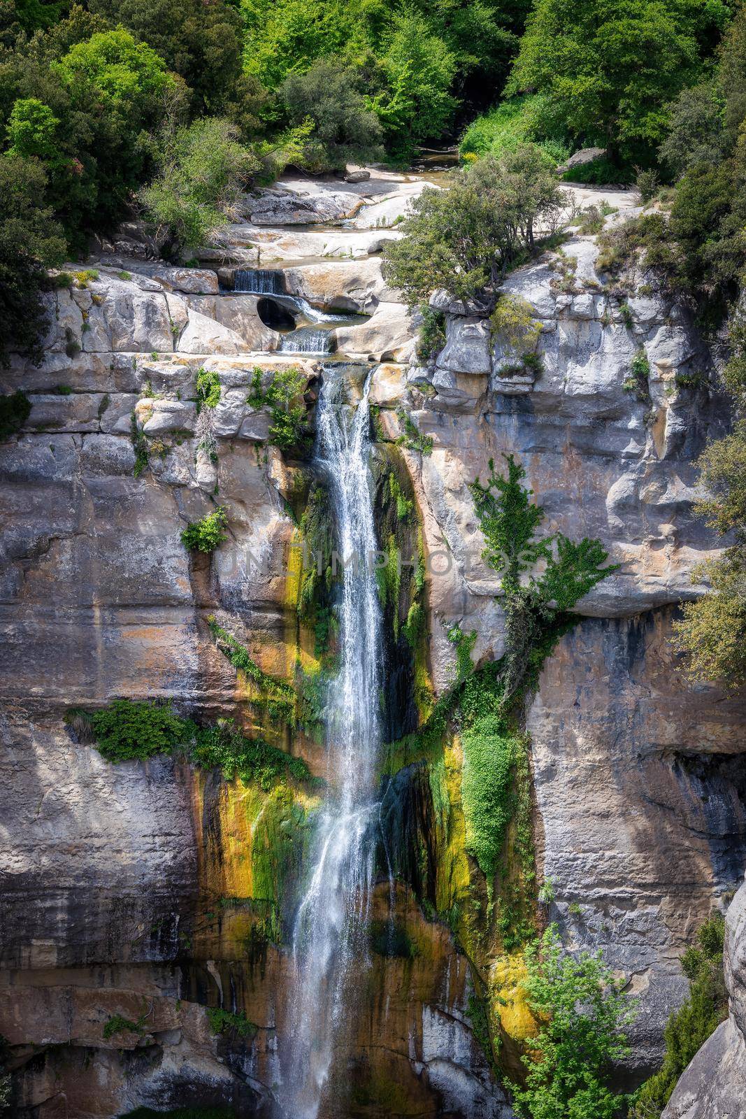 Beautiful big waterfall in Spain in Catalonia, near the small village Rupit. Salt de Sallent by Digoarpi
