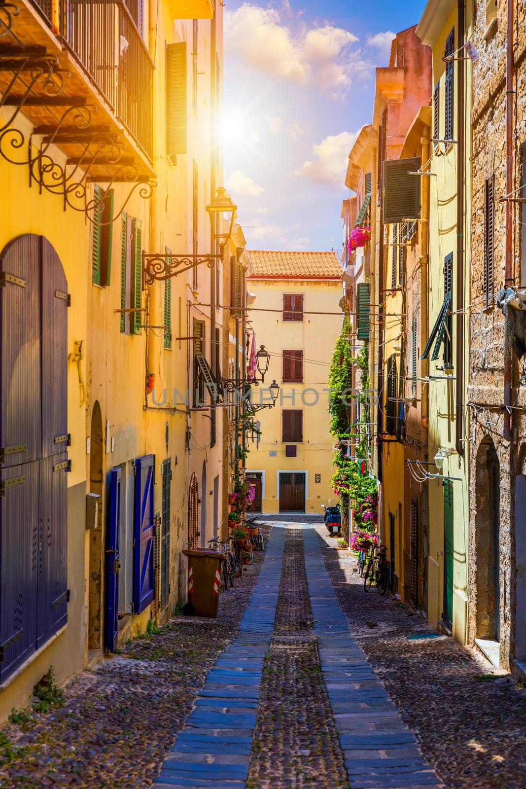 Alghero old town, Alghero street view on a beautiful day. Alghero, Italy. Panoramic aerial view of Alghero, Sardinia, Italy. 