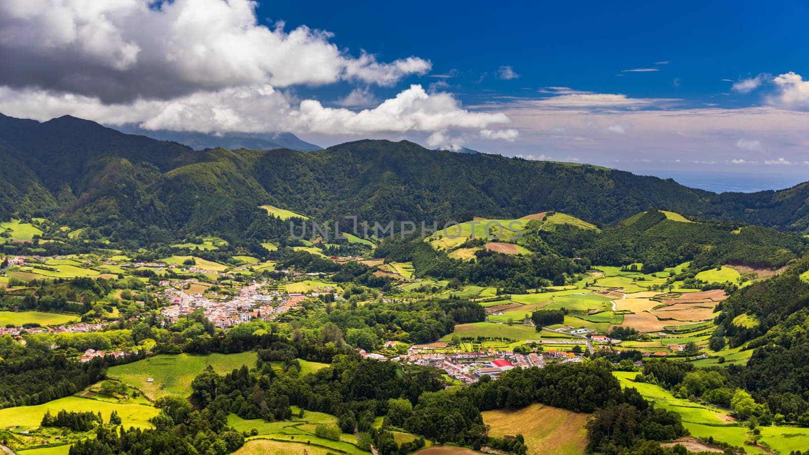 Aerial view of Lagoa das Furnas located on the Azorean island of Sao Miguel, Azores, Portugal. Lake Furnas (Lagoa das Furnas) on Sao Miguel, Azores, Portugal from the Pico do Ferro scenic viewpoint.