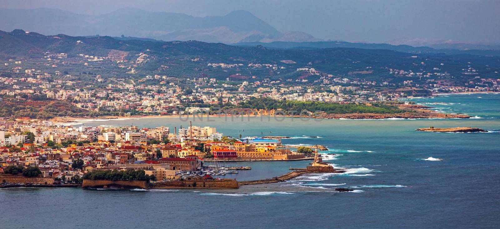 Old Venetian Harbour of Chania with fisihing Boats and Yachts in Crete, Greece. Chania, Crete, Greece. Chania is the second largest city of Crete and the capital of the Chania regional unit.