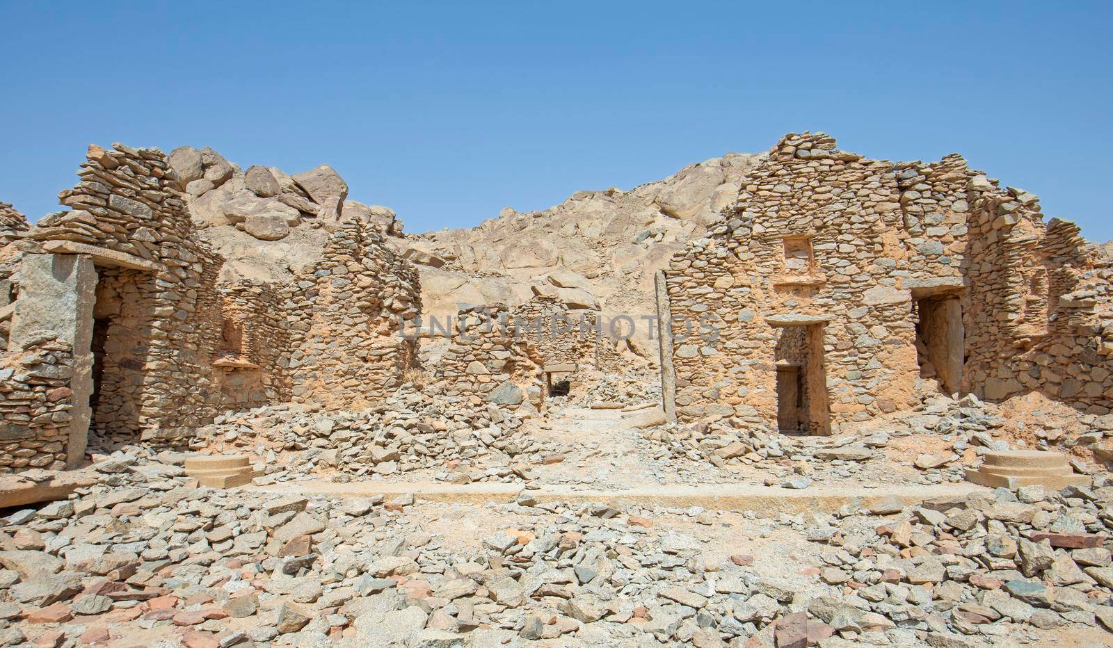 View across old abandoned ruins of Roman quarry town buildings at Mons Claudianus in Egyptian eastern desert