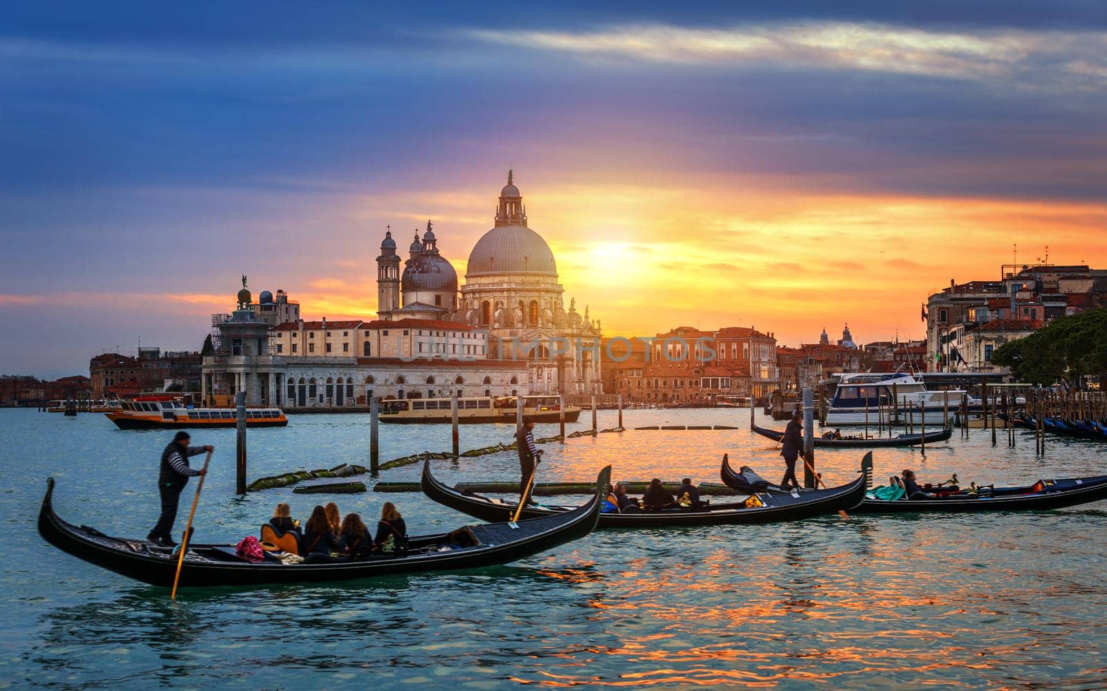 Canal with gondolas in Venice, Italy. Architecture and landmarks of Venice. Venice postcard with Venice gondolas.