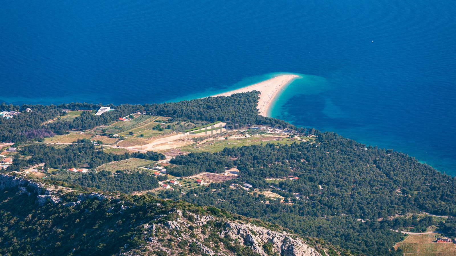 Beautiful panorama of famous Adriatic beach Zlatni Rat (Golden Cape or Golden Horn) with turquoise water , Island of Brac Croatia summertime. Famous Adriatic beach Zlatni Rat in Bol, Brac, Croatia.
