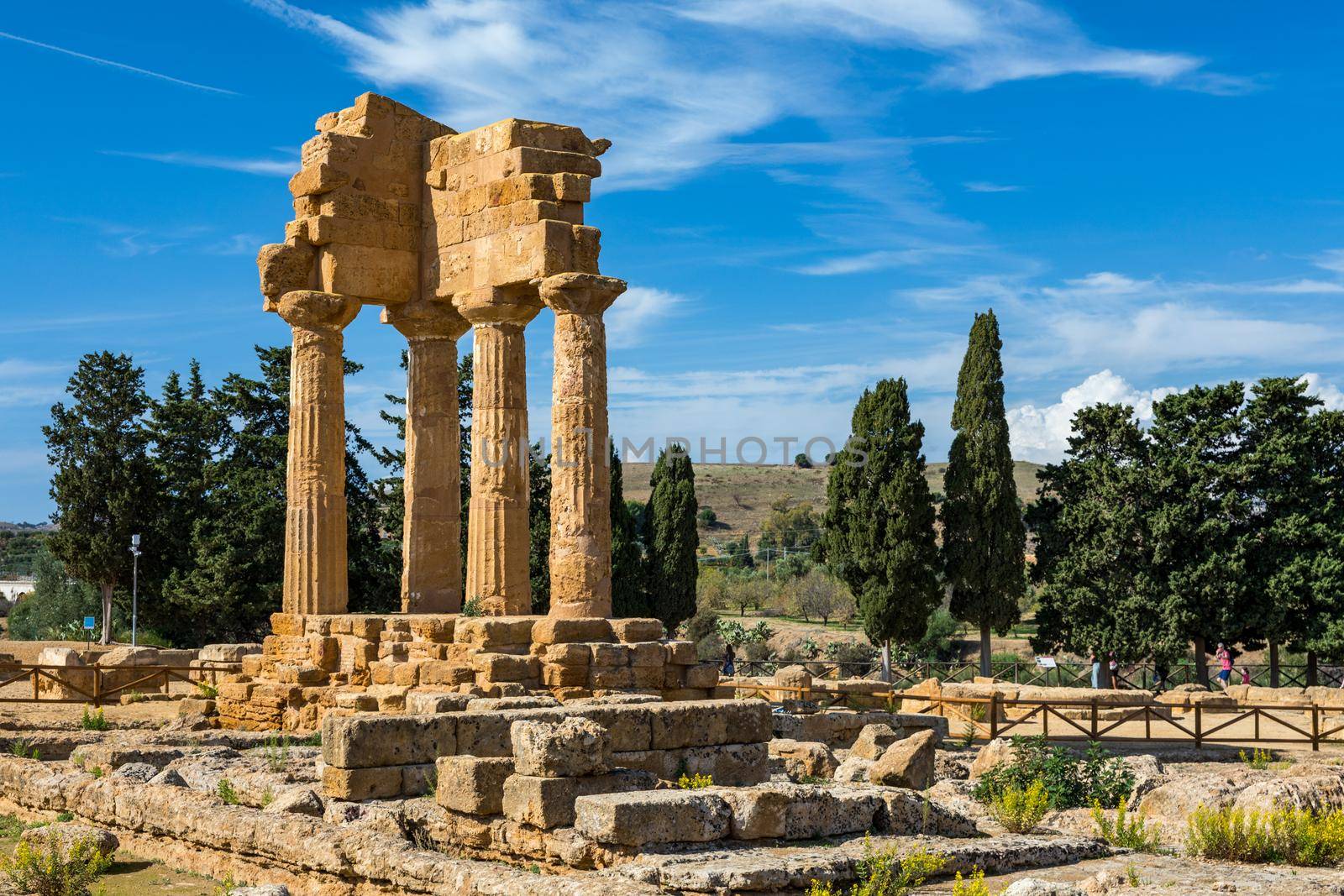 The temple of Castor and Pollux, Dioscuri brothers, panoramic banner image. It has only four columns left, it is symbol of Agrigento. Valley of the Temples in Agrigento, Sicily, Italy.