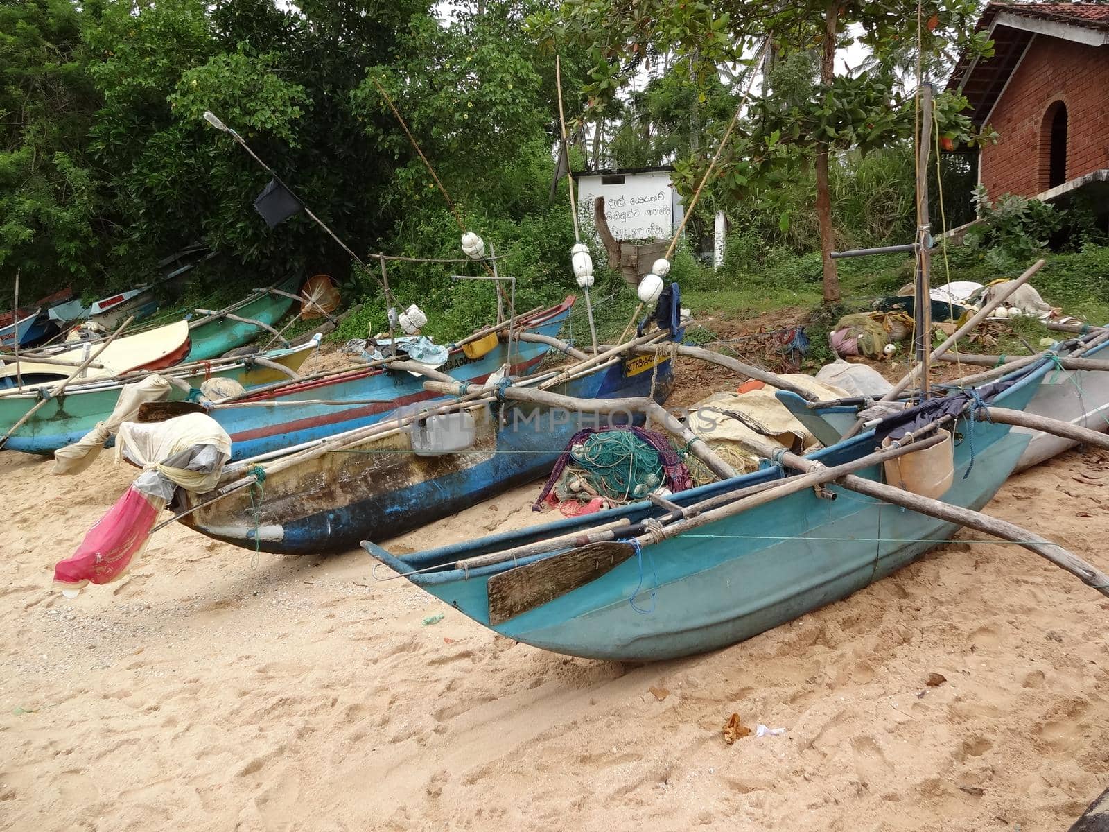 A catamaran fishing boat on a beach in Sri Lanka.