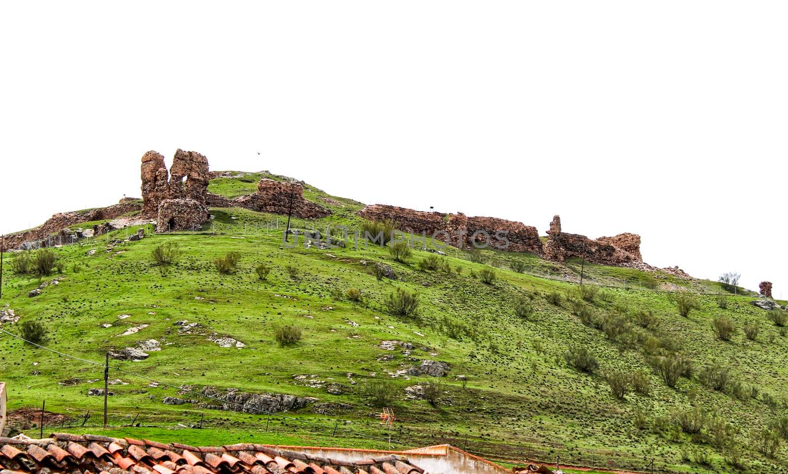 Old castle ruins in the mountain of Alcaraz in a cloudy day of spring. Alcaraz, Albacete, Spain.