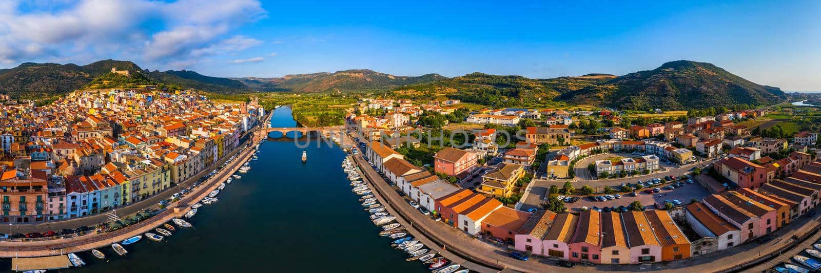 Beautiful view of Bosa town, Sardinia island, Italy. Travel destination. Bosa town with Ponte Vecchio bridge across the Temo river. Marvelous morning view of Sardinia island, Italy, Europe.