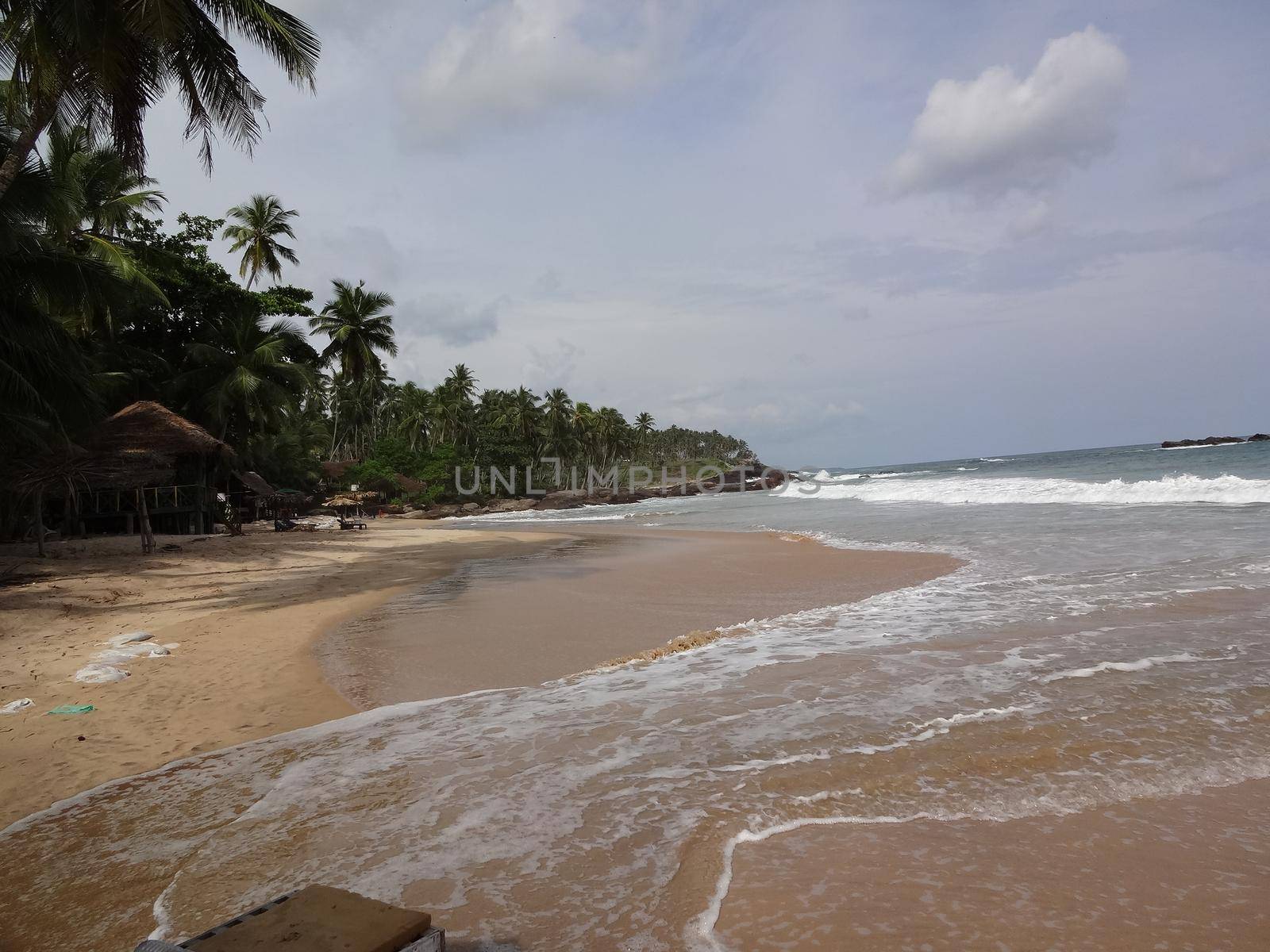 Golden beach near the city of Mirissa, Sri Lanka.