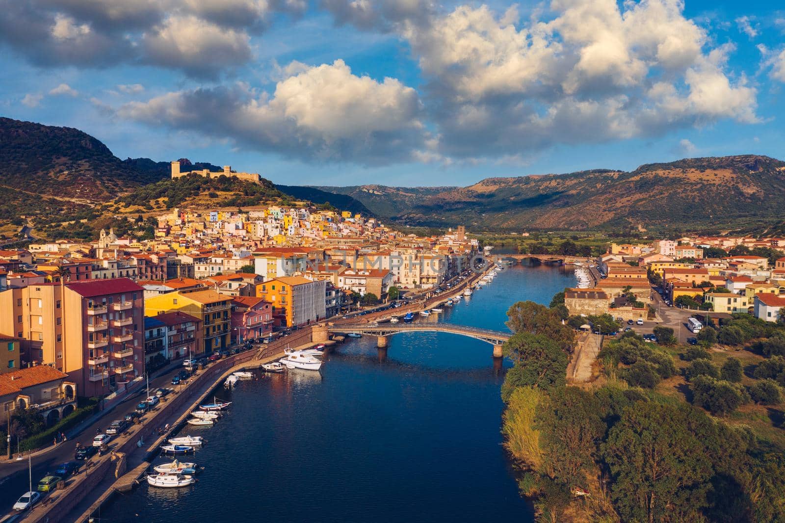 Beautiful view of Bosa town, Sardinia island, Italy. Travel destination. Bosa town with Ponte Vecchio bridge across the Temo river. Marvelous morning view of Sardinia island, Italy, Europe.