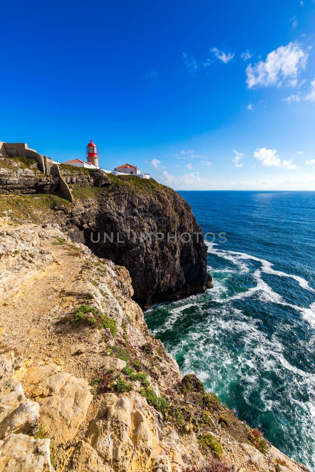 Portuguese coast, cliff into the Atlantic Ocean. Taken in Sagres, Faro, Algarve, Portugal. Beautiful coast of Portugal, Sagres.