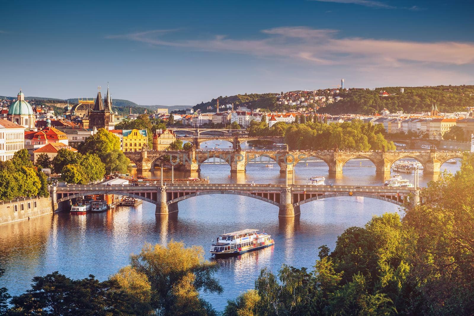 Prague Scenic spring sunset aerial view of the Old Town pier architecture and Charles Bridge over Vltava river in Prague, Czech Republic