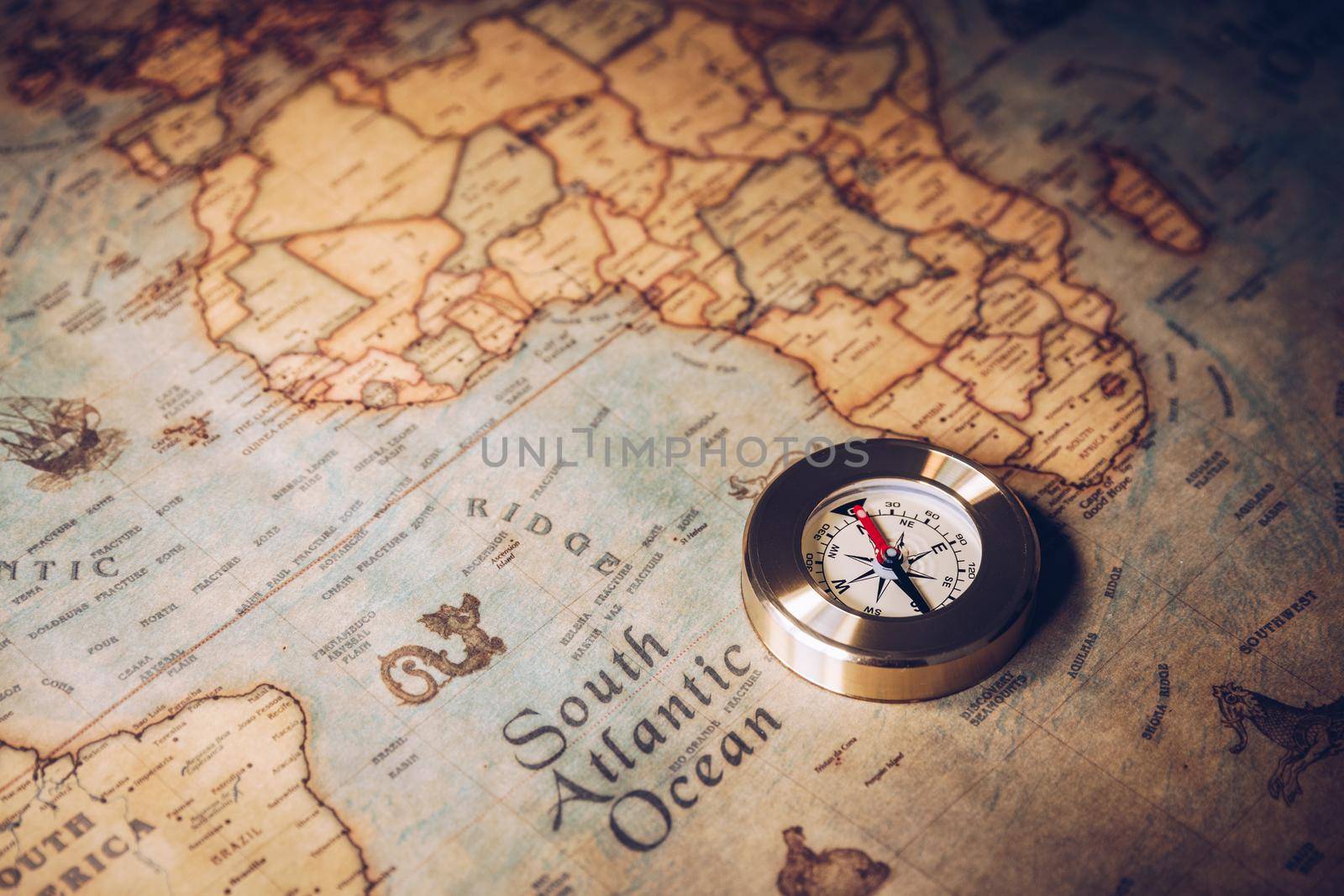 Columbus day and world map with compass