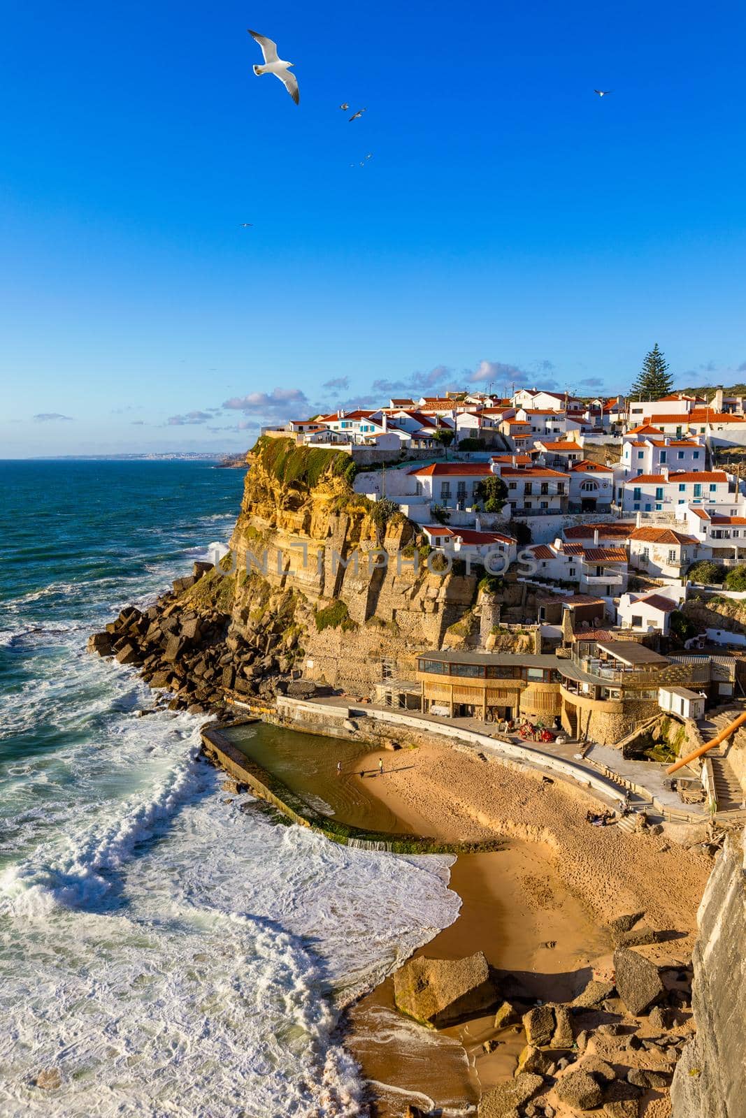 Azenhas do Mar is a seaside town in the municipality of Sintra, Portugal. Close to Lisboa. Azenhas do Mar white village, cliff and ocean, Sintra, Portugal. Azenhas Do Mar, Sintra, Portugal.