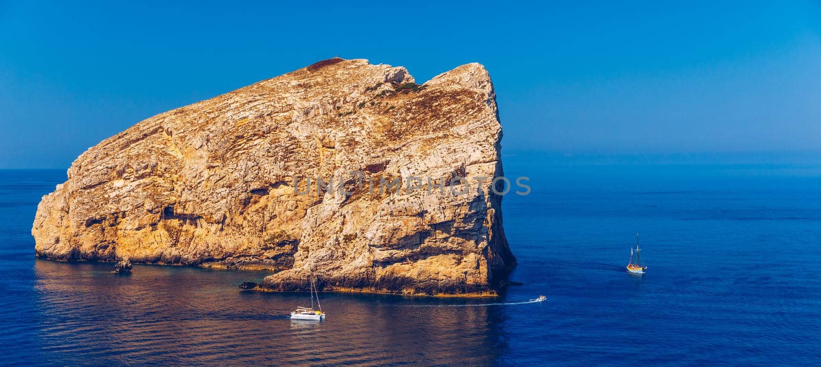 View from Capo Caccia on island Isola Foradada, Sardinia, Italy. Island Foradada at "Capo Caccia" near the town of Alghero on the island of Sardinia, Italy.