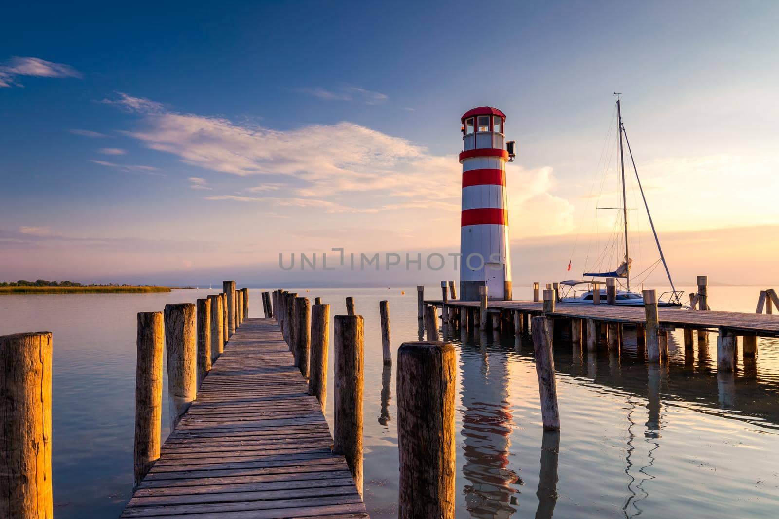Lighthouse at Lake Neusiedl at sunset near Podersdorf, Burgenland, Austria