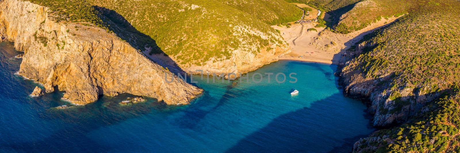 Cala Domestica beach, Sardinia, Italy. Sardinia is the second largest island in mediterranean sea. Sardinia, Cala Domestica beach, Italy. Beach Cala Domestica, Sardegna, Italy.