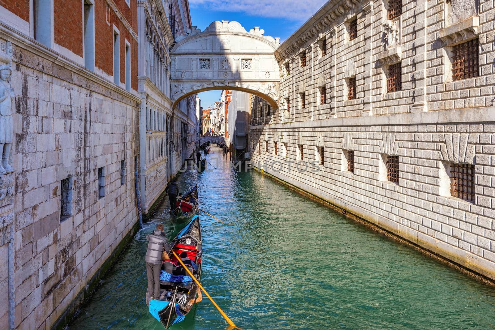 View of the Bridge of Sighs (Ponte dei Sospiri) and the Rio de Palazzo o de Canonica Canal from the Riva degli Schiavoni in Venice, Italy. The Ponte de la Canonica is visible in background.