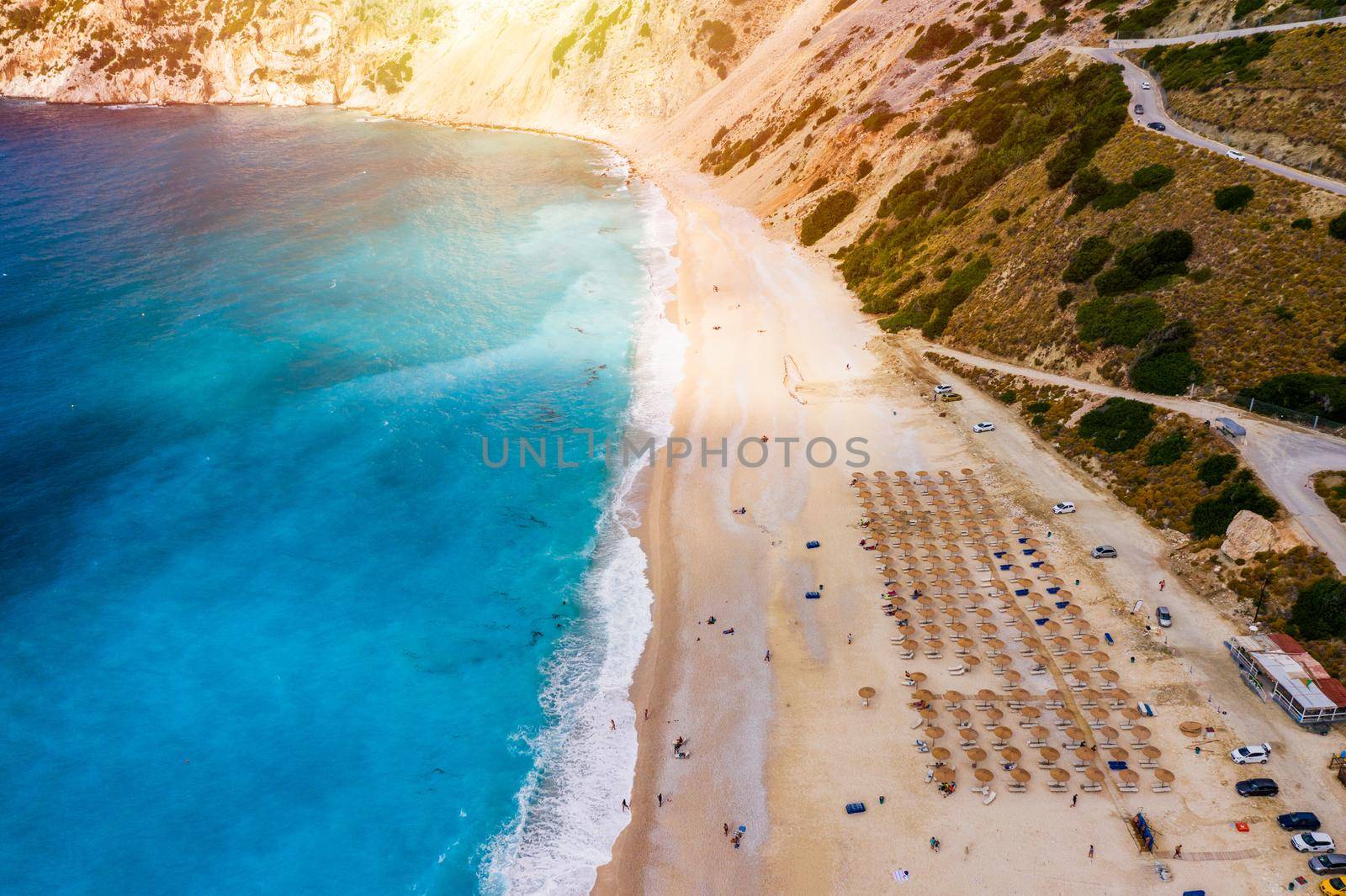 Aerial drone view of iconic turquoise and sapphire bay and beach of Myrtos, Kefalonia (Cephalonia) island, Ionian, Greece. Myrtos beach, Kefalonia island, Greece. Beautiful view of Myrtos beach.