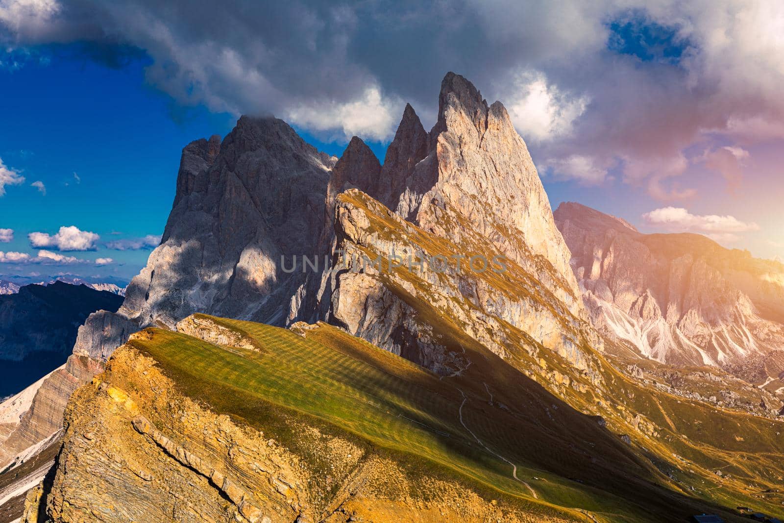 View on Seceda peak. Trentino Alto Adige, Dolomites Alps, South Tyrol, Italy. Odle mountain range, Val Gardena. Majestic Furchetta peak. Odles group seen from Seceda, Santa Cristina Val Gardena.