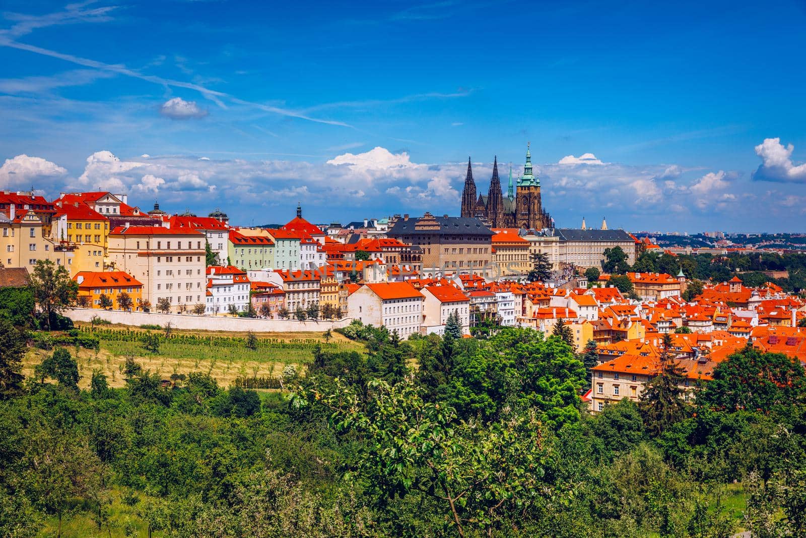 Prague Castle and Lesser Town panorama. View from Petrin Hill. Prague, Czech Republic. Spring Prague panorama from Prague Hill with Prague Castle, Vltava river and historical architecture. Czechia.