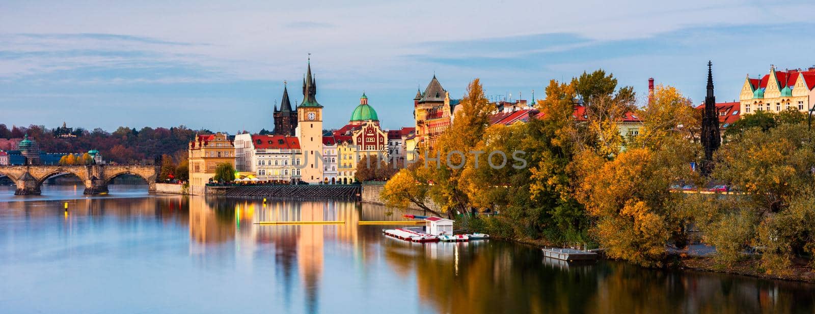 Charles Bridge in Prague in Czechia. Prague, Czech Republic. Charles Bridge (Karluv Most) and Old Town Tower. Vltava River and Charles Bridge. Concept of world travel, sightseeing and tourism.