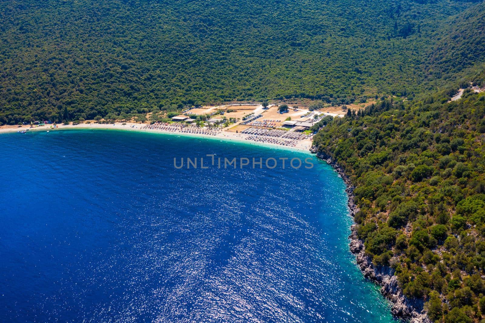 Beautiful crystal clear azure water at Antisamos beach on Kefalonia island, Greece. Beautiful sea bay with Antisamos beach on Kefalonia island, Ionian island, Cephalonia, Antisamos beach, Greece. 