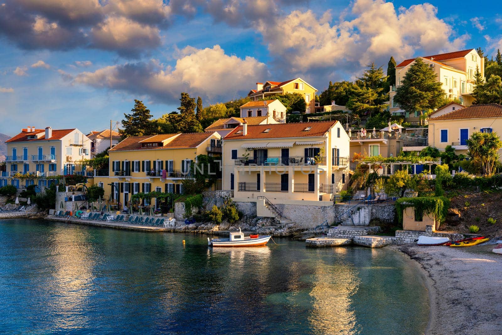 Fiskardo village, Kefalonia island, Greece. Fiscardo on the Island of Kefalonia in Greece. The holiday destination. Beautiful beach in Fiskardo, Kefalonia, Greece