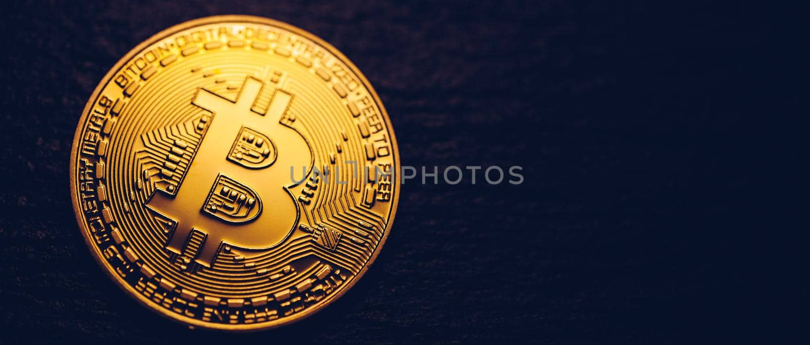 Crypto currency golden coin with bitcoin symbol on isolated on black background. Bitcoin Coin on black background. Bitcoin cryptocurrency.  Cryptocurrency Coin Concept.