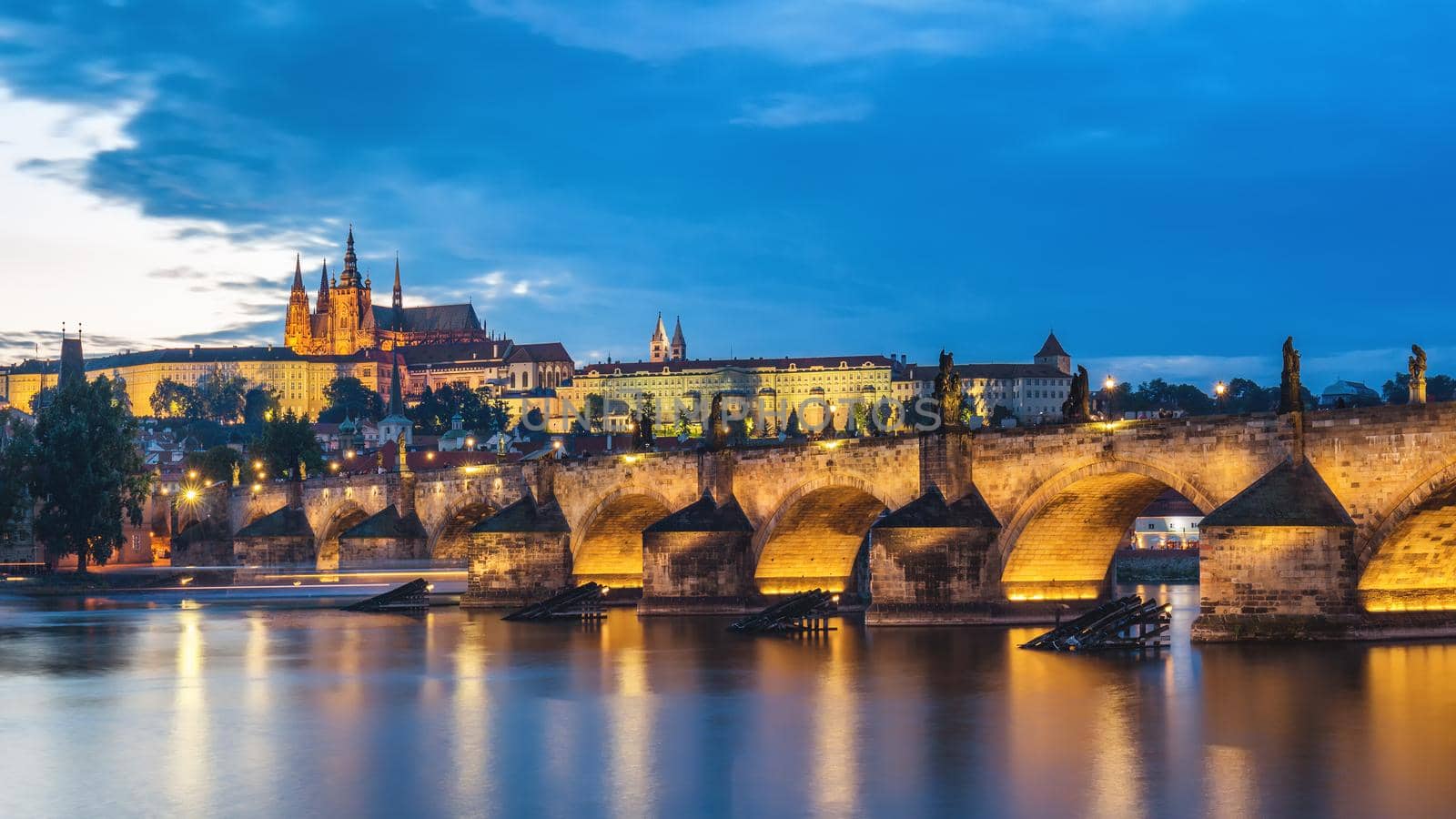 Famous iconic image of Prague castle and Charles Bridge, Prague, Czech Republic. Concept of world travel, sightseeing and tourism.