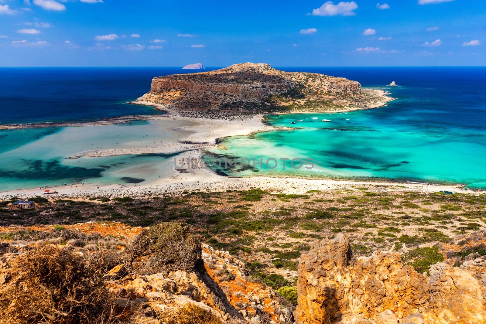 Amazing beach with turquoise water at Balos Lagoon and Gramvousa in Crete, Greece. Cap tigani in the center. Balos beach on Crete island, Greece. Landscape of Balos beach at Crete island in Greece.