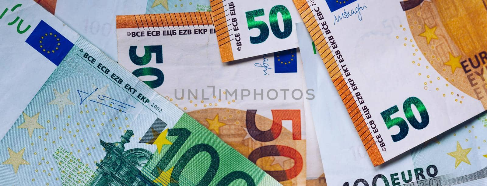 Euro money, Euro cash background. Banknotes of the european union. Euro cash. Many Euro banknotes of different values.  by DaLiu