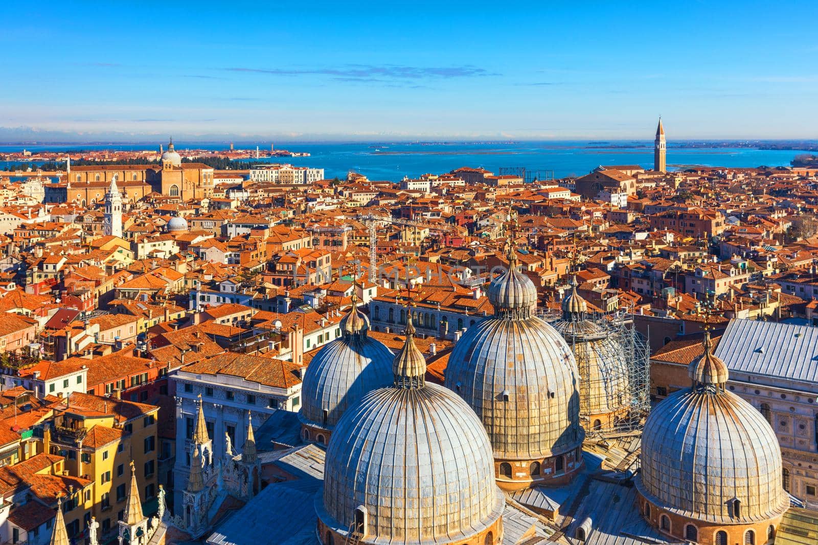 Venice panoramic aerial view with red roofs, Veneto, Italy. Aerial view of the Venice city, Italy. Venice is a popular tourist destination of Europe. Venice, Italy.