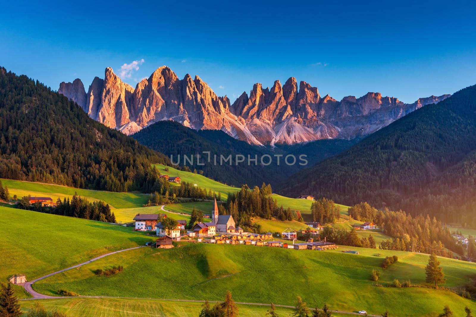Santa Maddalena (Santa Magdalena) village with magical Dolomites mountains in background, Val di Funes valley, Trentino Alto Adige region, South Tyrol, Italy, Europe. Santa Maddalena Village, Italy. 